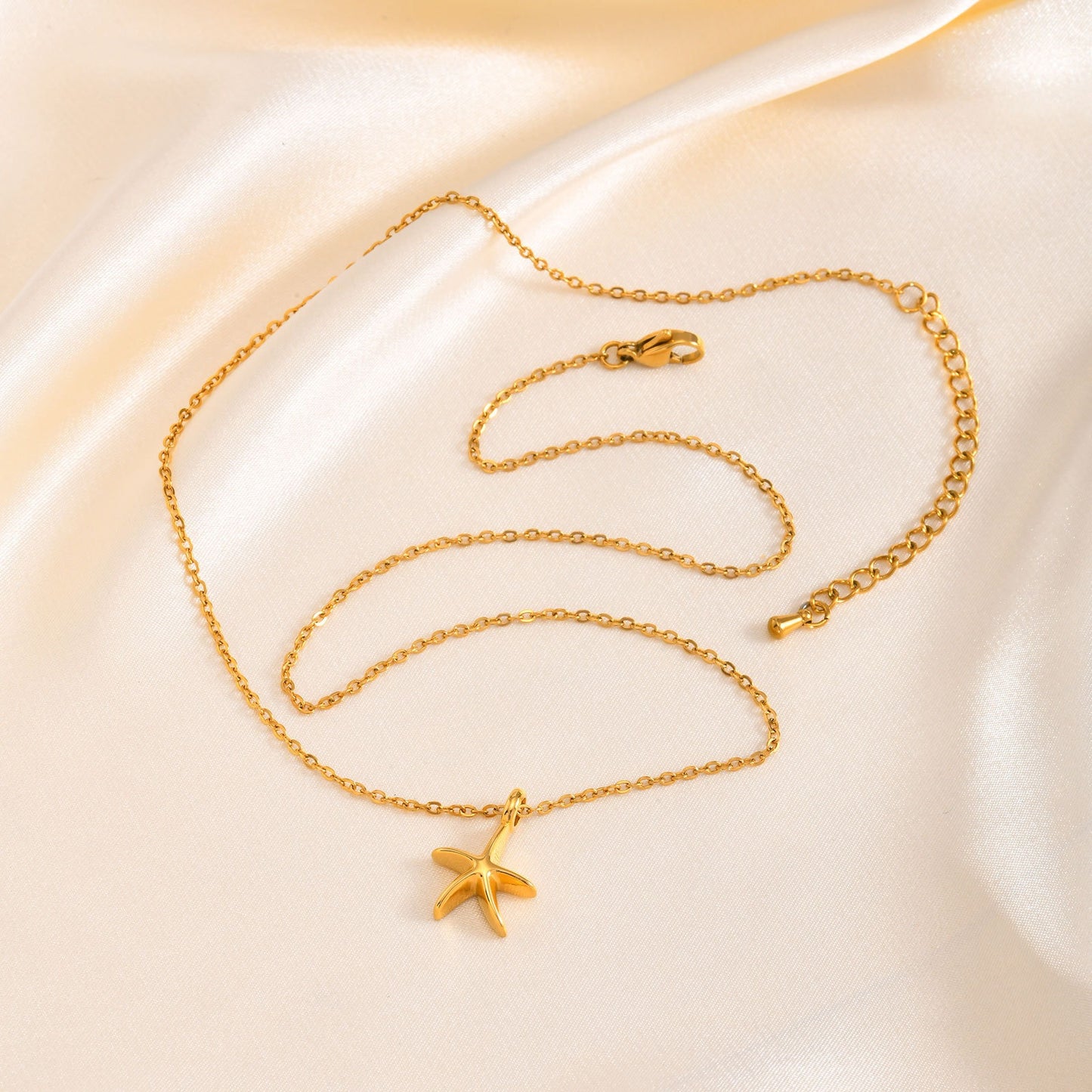 Collar con colgante de estrella de mar y perla Kemstone Ocean Whisper: joyería minimalista de acero inoxidable para combinar con elegancia diaria NC-1847