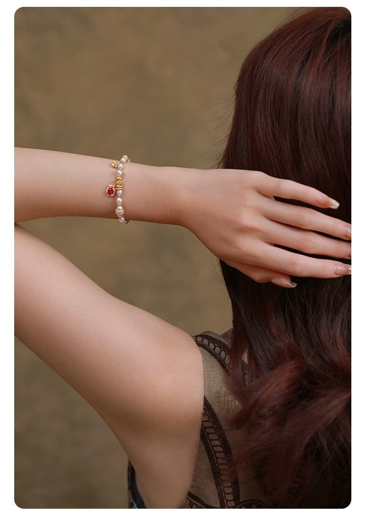 Pulsera con dije "Serpiente de la Fortuna" de Kemstone, hecha a mano • Oro vermeil de 18 quilates • Perlas naturales RSY-B609357
