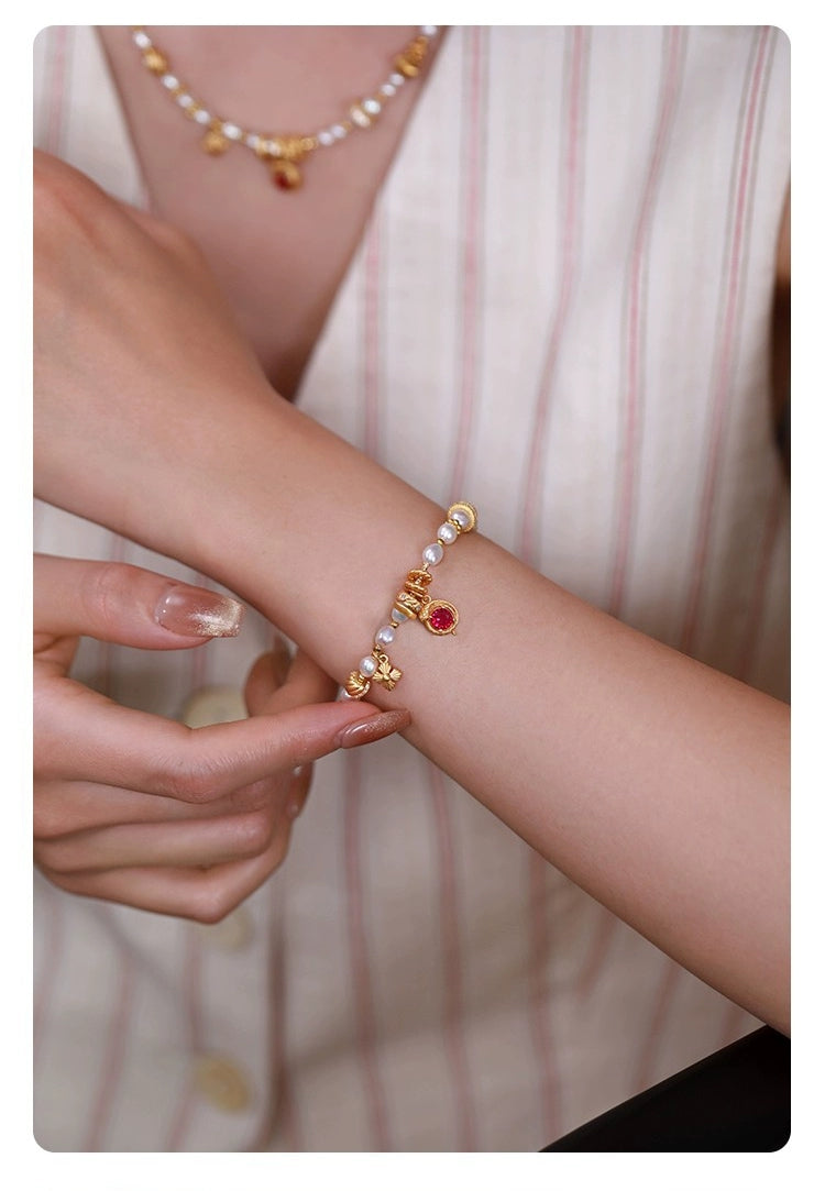 Pulsera con dije "Serpiente de la Fortuna" de Kemstone, hecha a mano • Oro vermeil de 18 quilates • Perlas naturales RSY-B609357