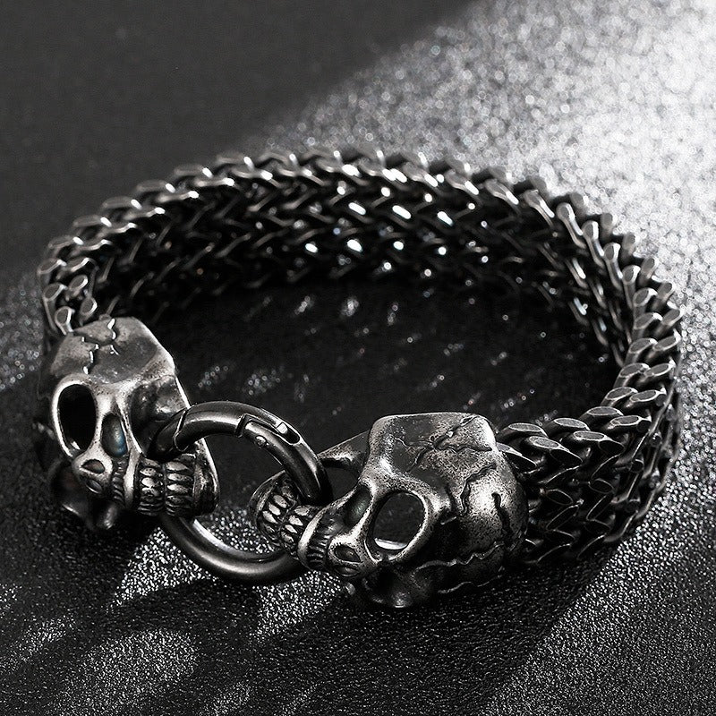 Pulsera Kemstone con calavera, lobo y cabeza de león - Cadena de acero de titanio con borde punk KB144489