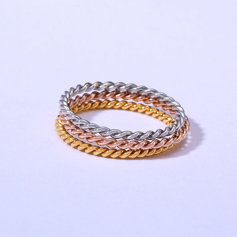 Anillo de acero de titanio trenzado Kemstone - Diseño minimalista en espiral para mujer R243