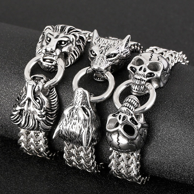 Pulsera Kemstone con calavera, lobo y cabeza de león - Cadena de acero de titanio con borde punk KB144489