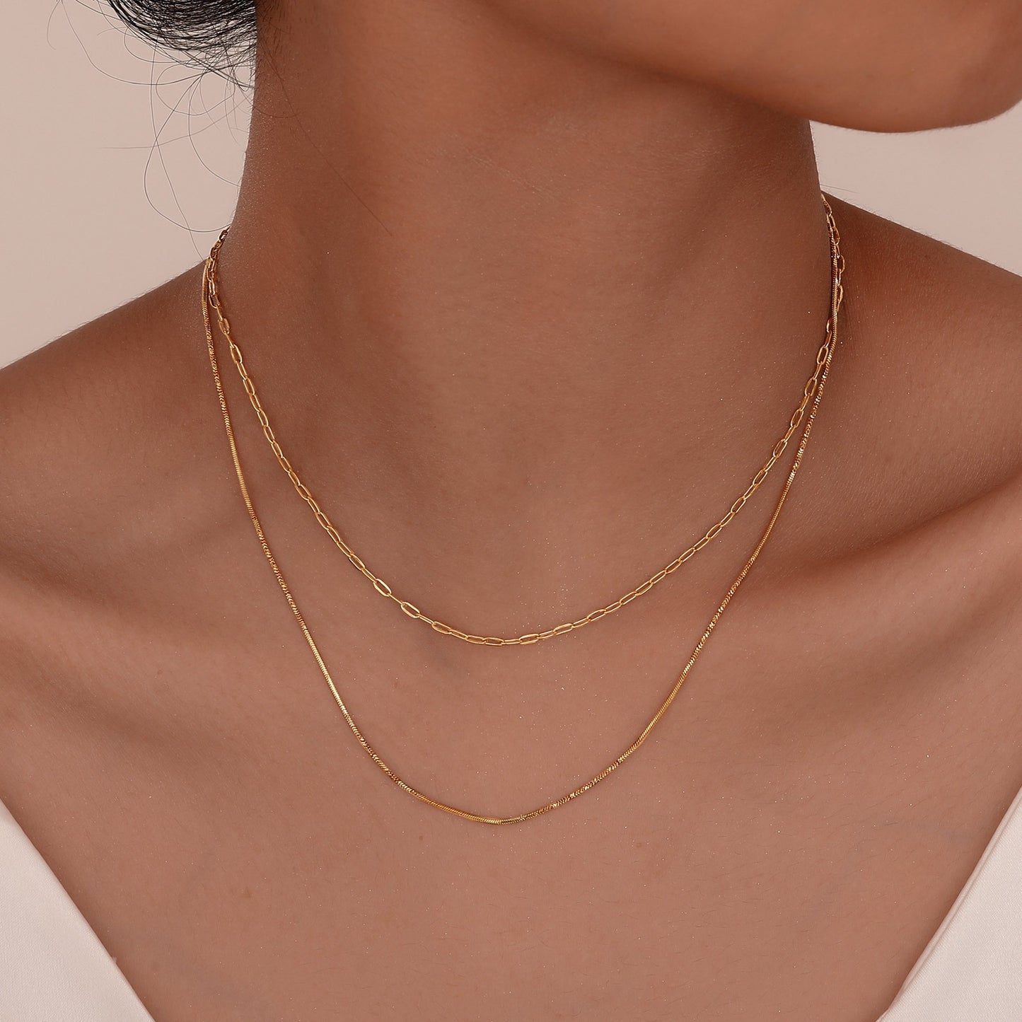 Collar de acero inoxidable en capas Kemstone - Cadena de serpiente cuadrada retorcida con diseño de doble apilamiento en dorado para mujer NC1874