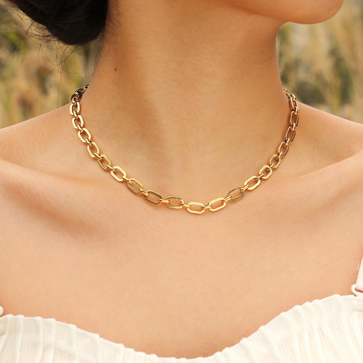Conjunto de cadena cruzada de acero inoxidable Kemstone: collar y pulsera minimalistas en tono dorado para una elegancia cotidiana BR-1763