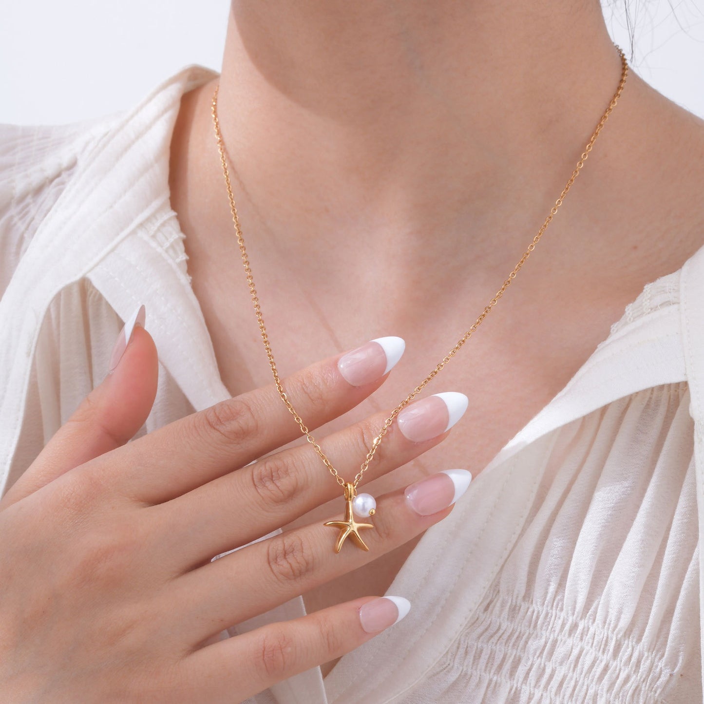 Collar con colgante de estrella de mar y perla Kemstone Ocean Whisper: joyería minimalista de acero inoxidable para combinar con elegancia diaria NC-1847