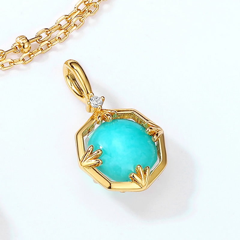 Collana con ciondolo in amazzonite e cristallo bianco vintage, realizzata a mano da Kemstone, dal design originale, in argento Sterling 925 con motivo geometrico.