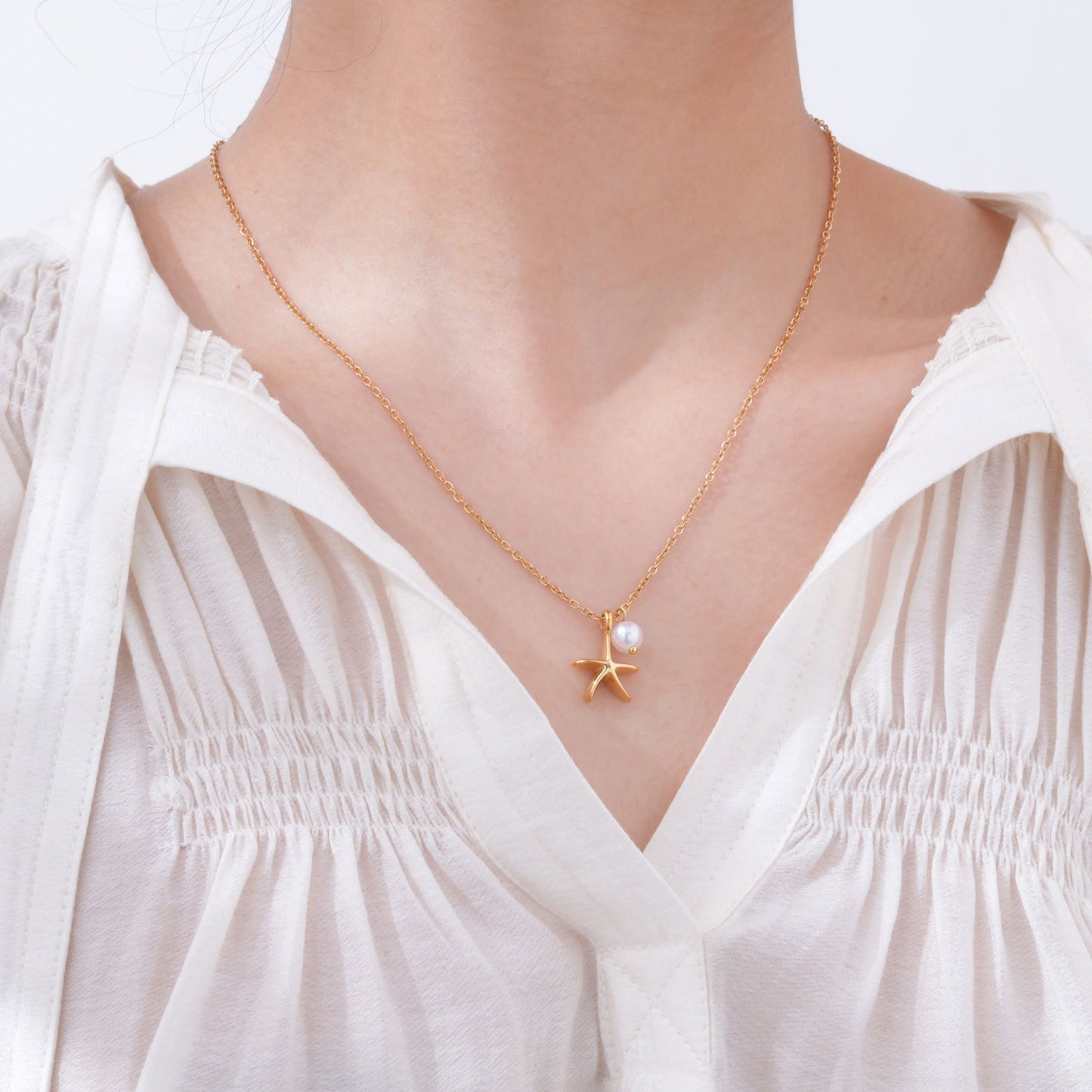 Collar con colgante de estrella de mar y perla Kemstone Ocean Whisper: joyería minimalista de acero inoxidable para combinar con elegancia diaria NC-1847