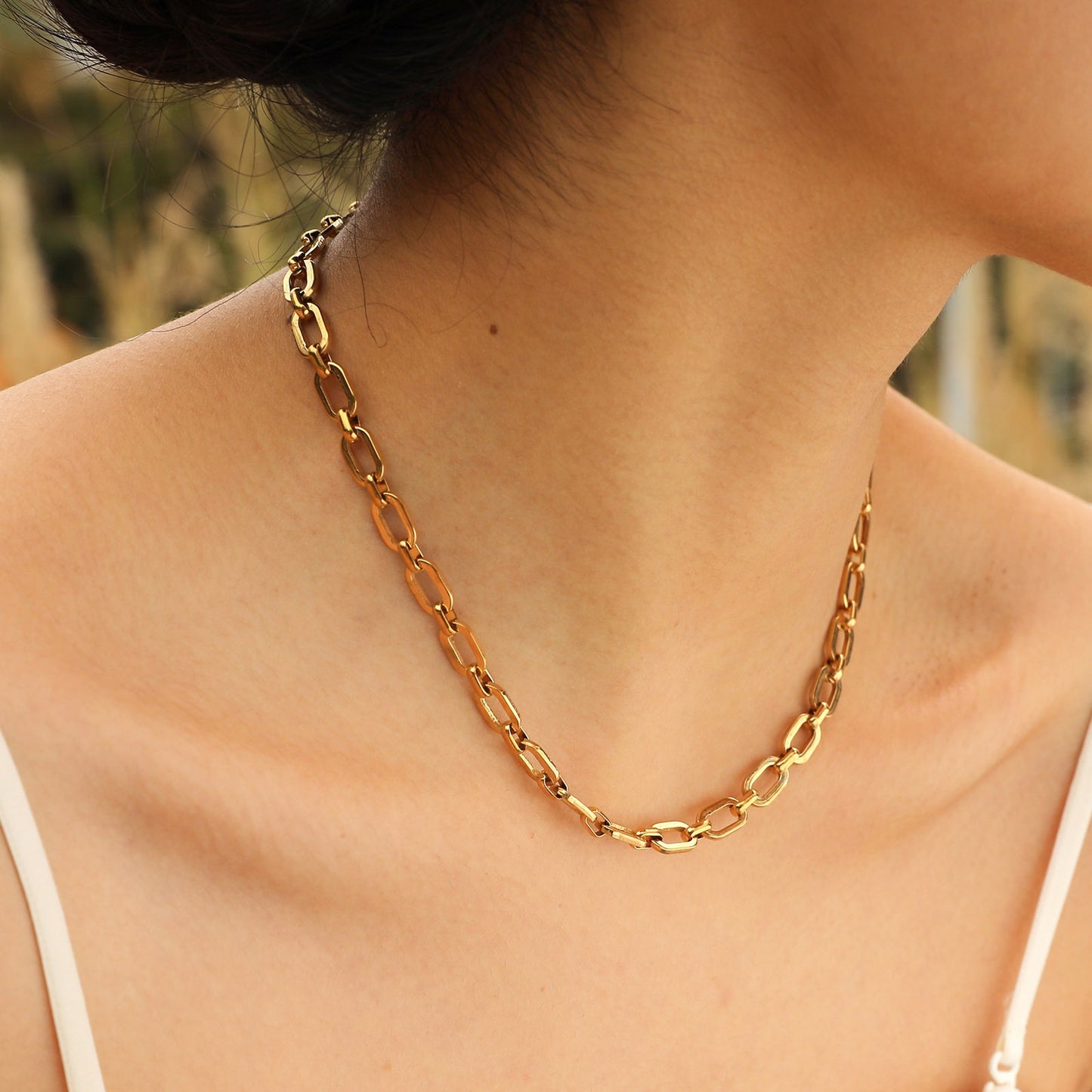 Conjunto de cadena cruzada de acero inoxidable Kemstone: collar y pulsera minimalistas en tono dorado para una elegancia cotidiana BR-1763