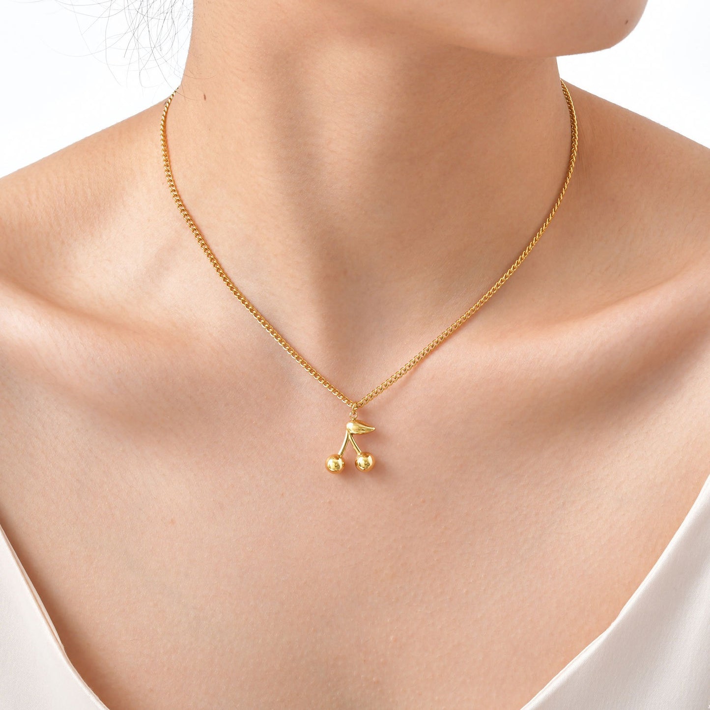 Collar minimalista de cadena cepillada de acero inoxidable Kemstone con colgante de flor de cerezo - Detalles dorados para mujer NC1968