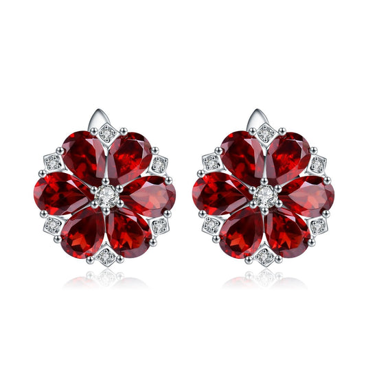 Pendientes de flor de gemas naturales de diseño original hechos a mano por Kemstone con granate y topacio azul Londres en plata de ley S925 para mujer.