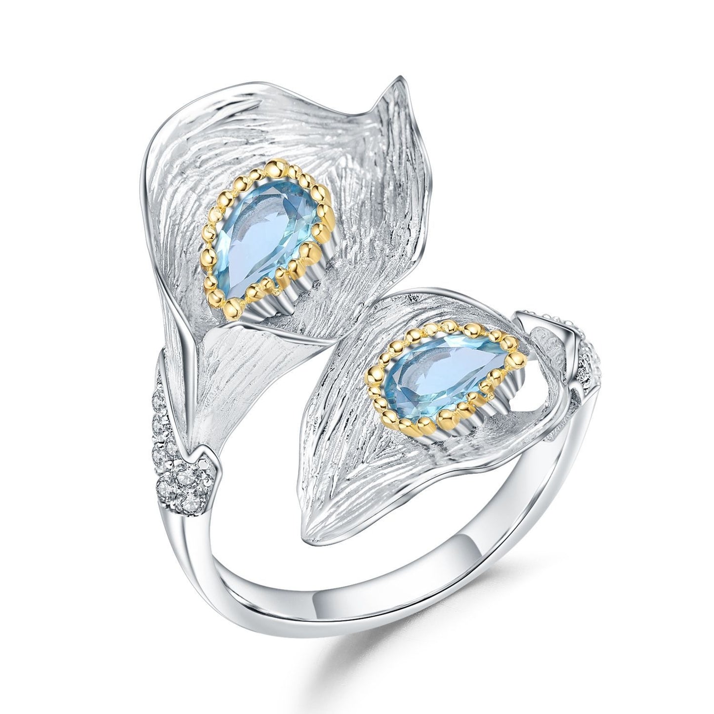 Anillos abiertos en forma de hoja de plata de ley con diseño original artesanal de Kemstone y piedras preciosas de topacio azul suizo natural.