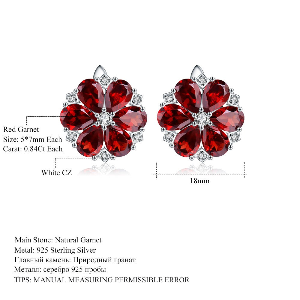 Pendientes de flor de gemas naturales de diseño original hechos a mano por Kemstone con granate y topacio azul Londres en plata de ley S925 para mujer.