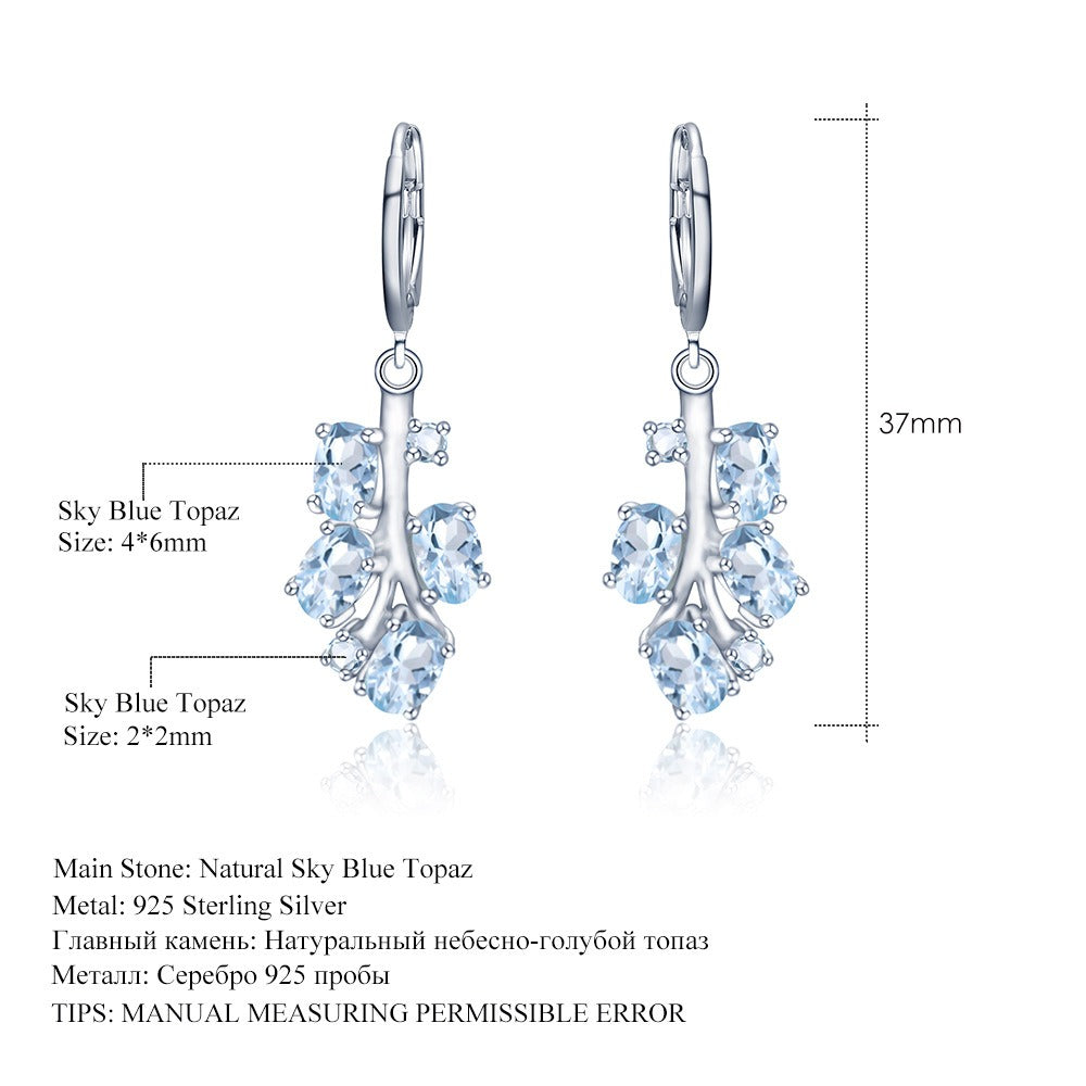Pendientes de plata de ley con diseño original de Kemstone, hechos a mano, con topacio y peridoto naturales.