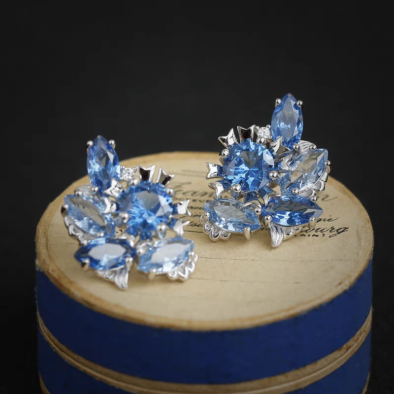 Pendientes de ola de marea de diseño original hechos a mano por Kemstone: pendientes de plata de ley bañados en oro con piedras preciosas marquesas azules vintage.
