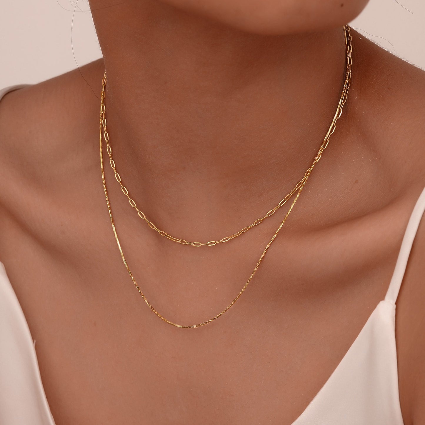 Collar de acero inoxidable en capas Kemstone - Cadena de serpiente cuadrada retorcida con diseño de doble apilamiento en dorado para mujer NC1874
