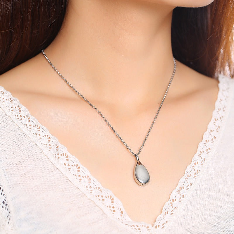 Colgante conmemorativo de acero inoxidable Kemstone con forma de lágrima – Urna de recuerdo para cenizas PN-1261