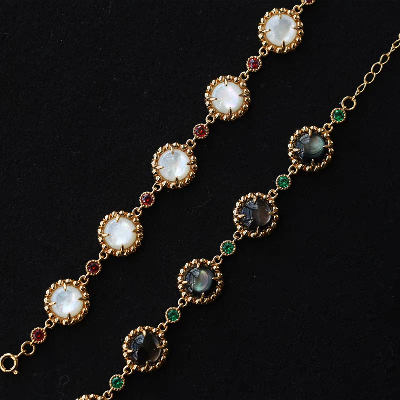 Pulsera de plata de ley 925 de inspiración vintage con diseño original de Culaccino, hecha a mano por Kemstone, con nácar blanco o concha Aurora.