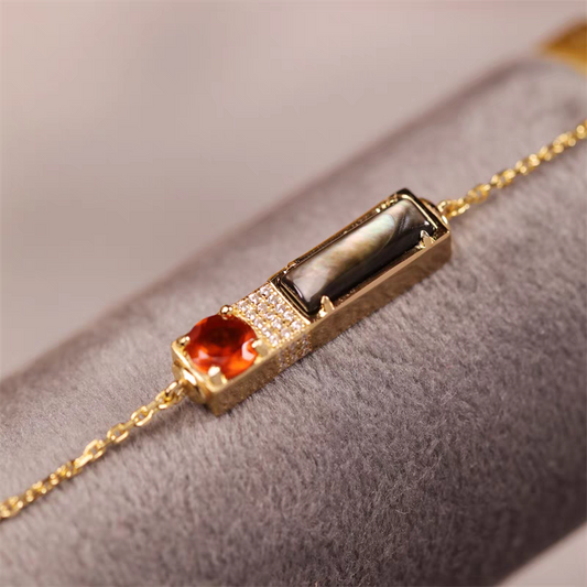 Pulsera de diseño original artesanal de Kemstone "Crepúsculo al atardecer" - Pulsera rectangular con colgante de granate y concha negra en plata de ley