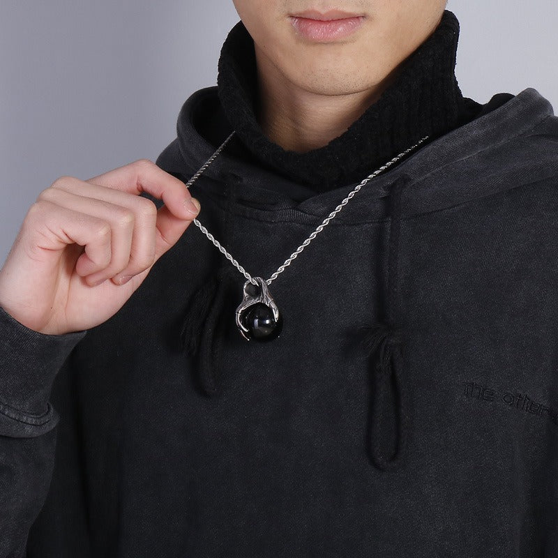 Kemstone Men’s Titanium Steel Claw Pendant – Black Glass Orb KP43972
