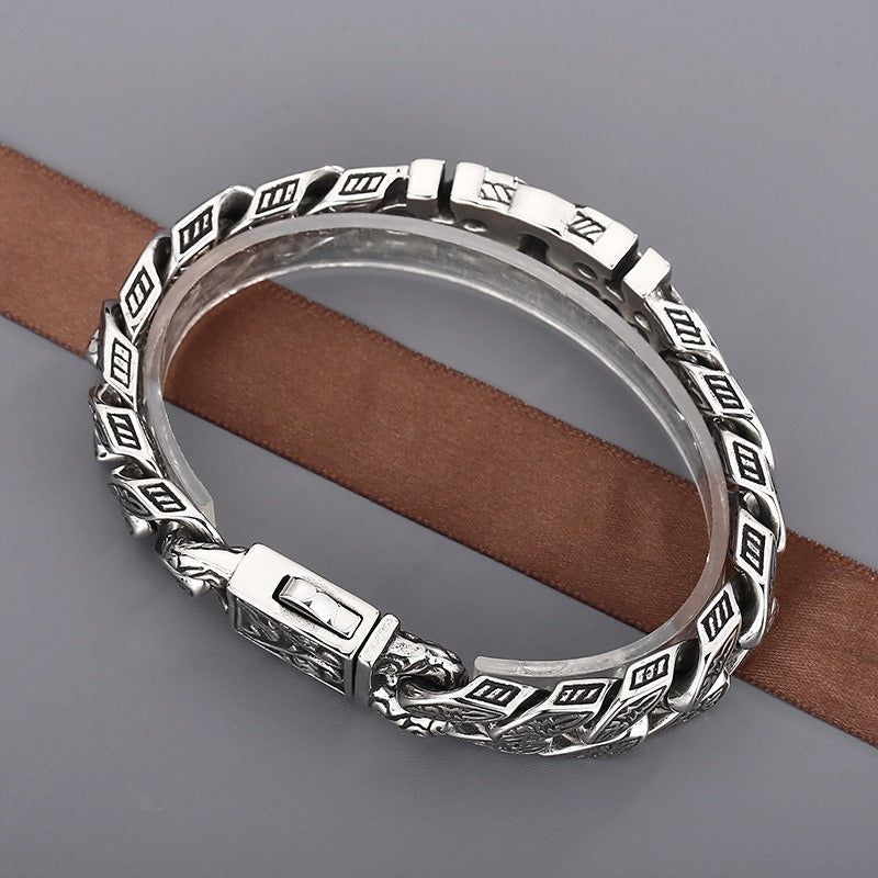 Pulsera Kemstone de acero y titanio con calavera punk para hombre - Diseño urbano audaz KB154968