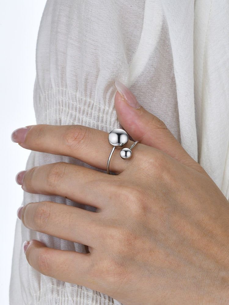 Elegante anillo ajustable de acero inoxidable con acabado dorado para mujer RC-536