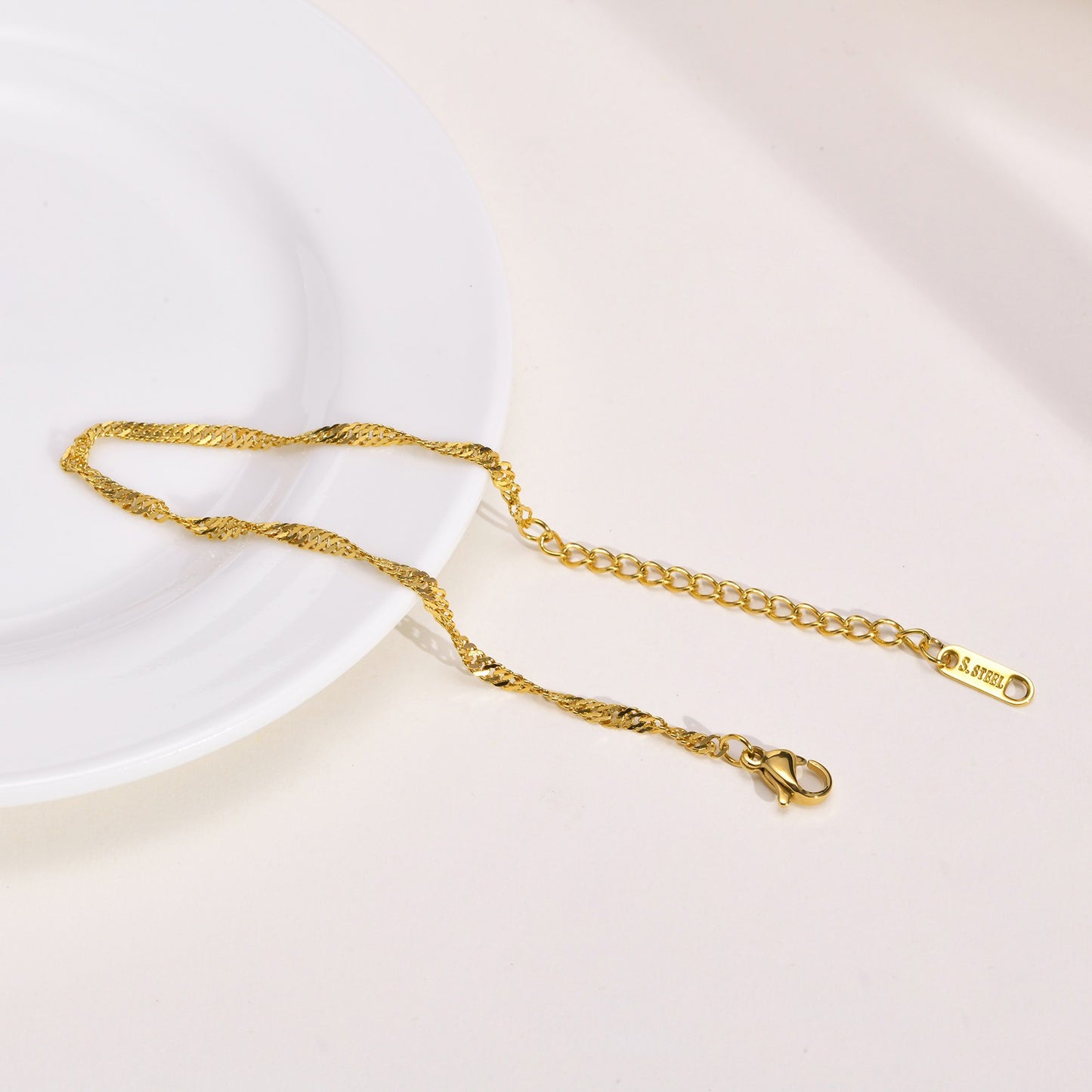 Bracciale e cavigliera in acciaio inossidabile con effetto onda d'acqua - Eleganza personalizzata per la grazia quotidiana BR-1315