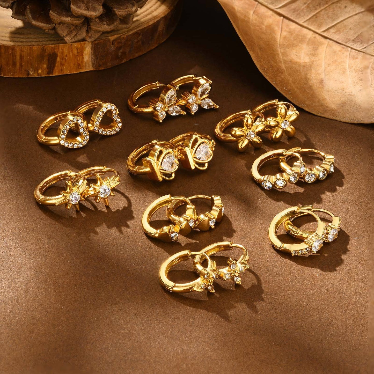 Preciosos aros de acero inoxidable dorado con circonitas: corazón, estrella, cruz y más estilos EH-722