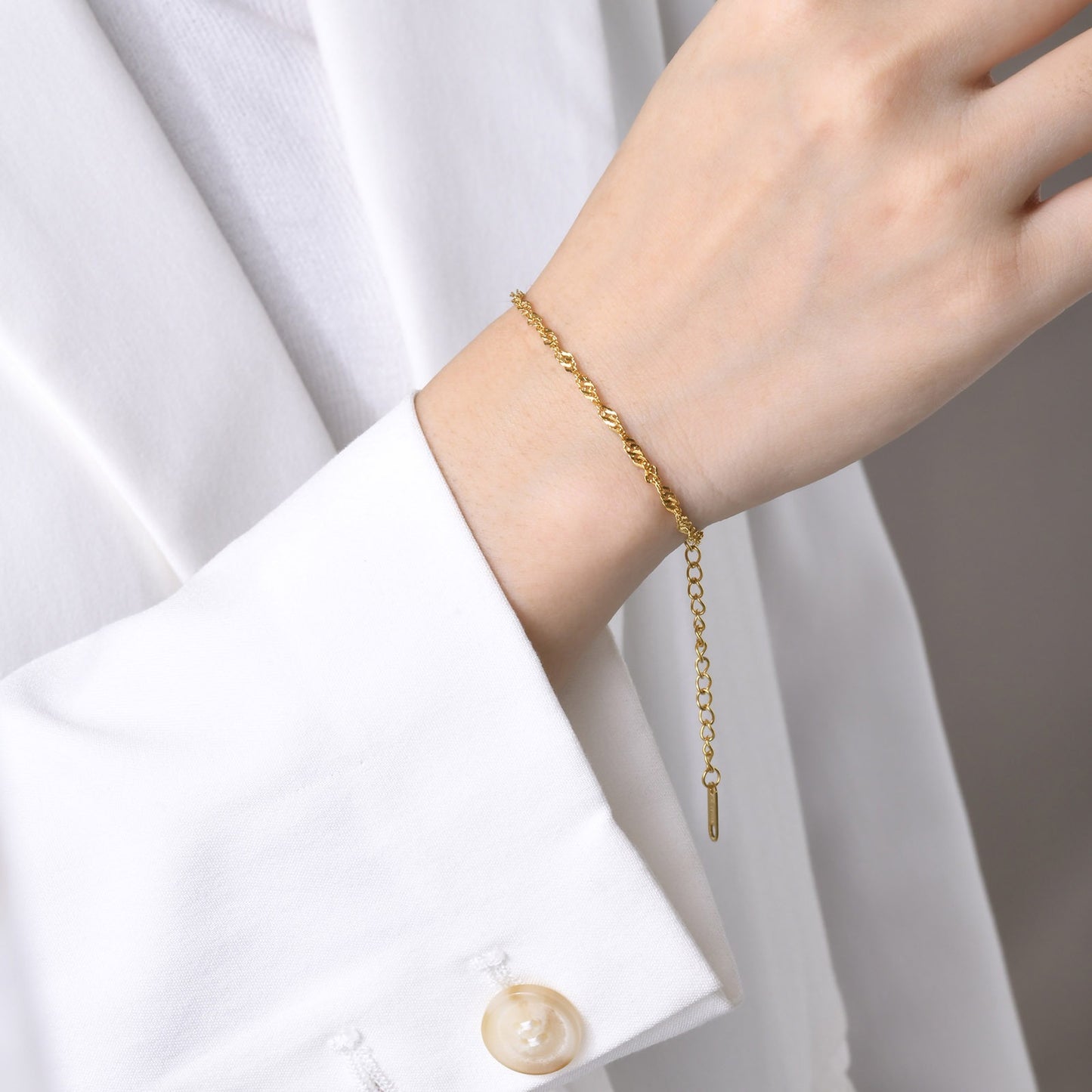 Bracciale e cavigliera in acciaio inossidabile con effetto onda d'acqua - Eleganza personalizzata per la grazia quotidiana BR-1315