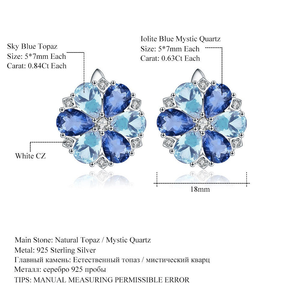 Pendientes de flor de gemas naturales de diseño original hechos a mano por Kemstone con granate y topacio azul Londres en plata de ley S925 para mujer.