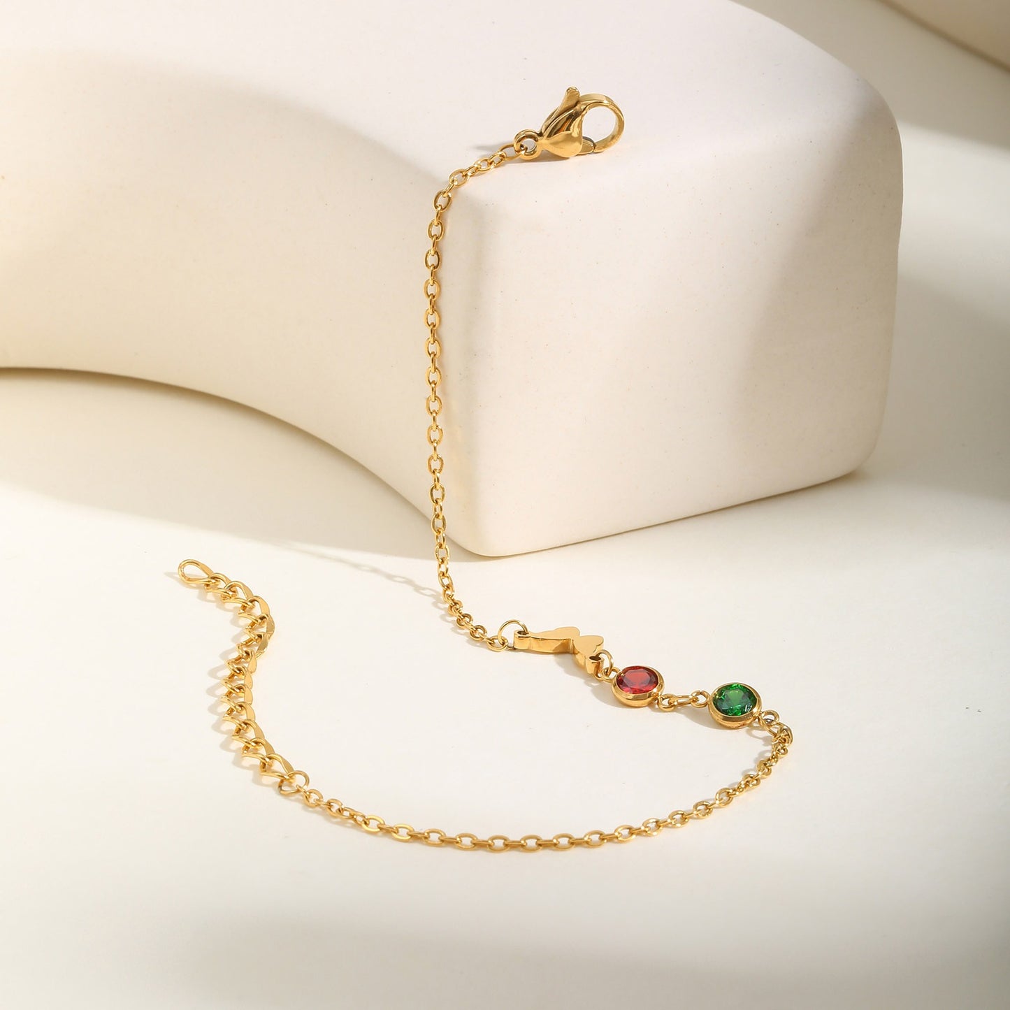 Stainless Steel Flat Cross Chain Bracelet with Red/Green Zirconia Butterfly Accents – Elegant Jewelry for Women BR-2142
