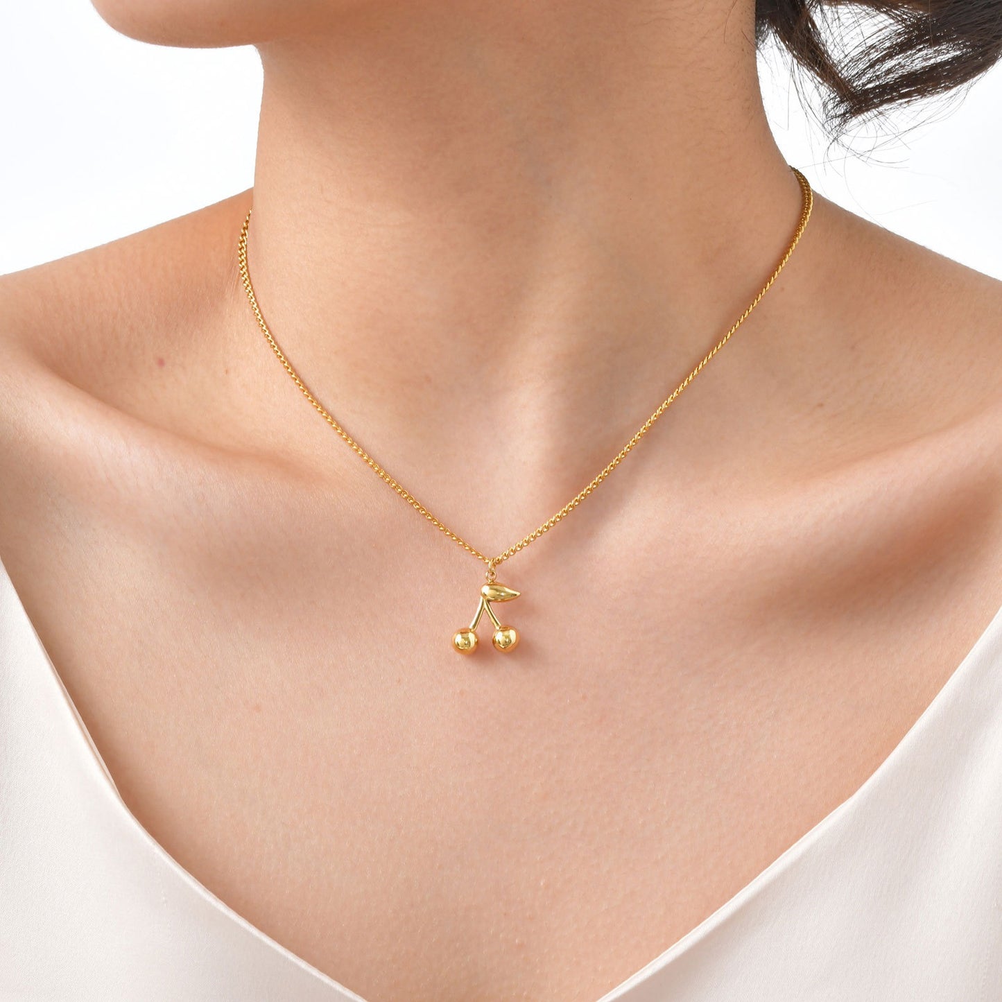 Collar minimalista de cadena cepillada de acero inoxidable Kemstone con colgante de flor de cerezo - Detalles dorados para mujer NC1968
