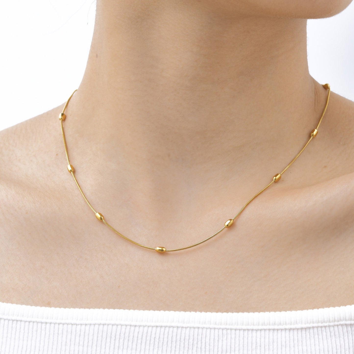 Collar de cadena de serpiente Kemstone de acero inoxidable dorado - Diseño delicado con cuentas para mujer, joya minimalista para el día a día NC-1639