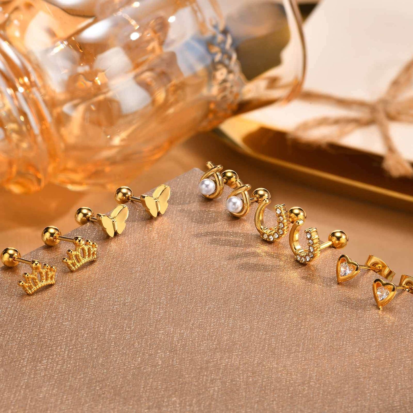 Elegancia sin esfuerzo: Aros dorados en forma de U de acero inoxidable hipoalergénico para mujer – Joyería minimalista atemporal ES-621