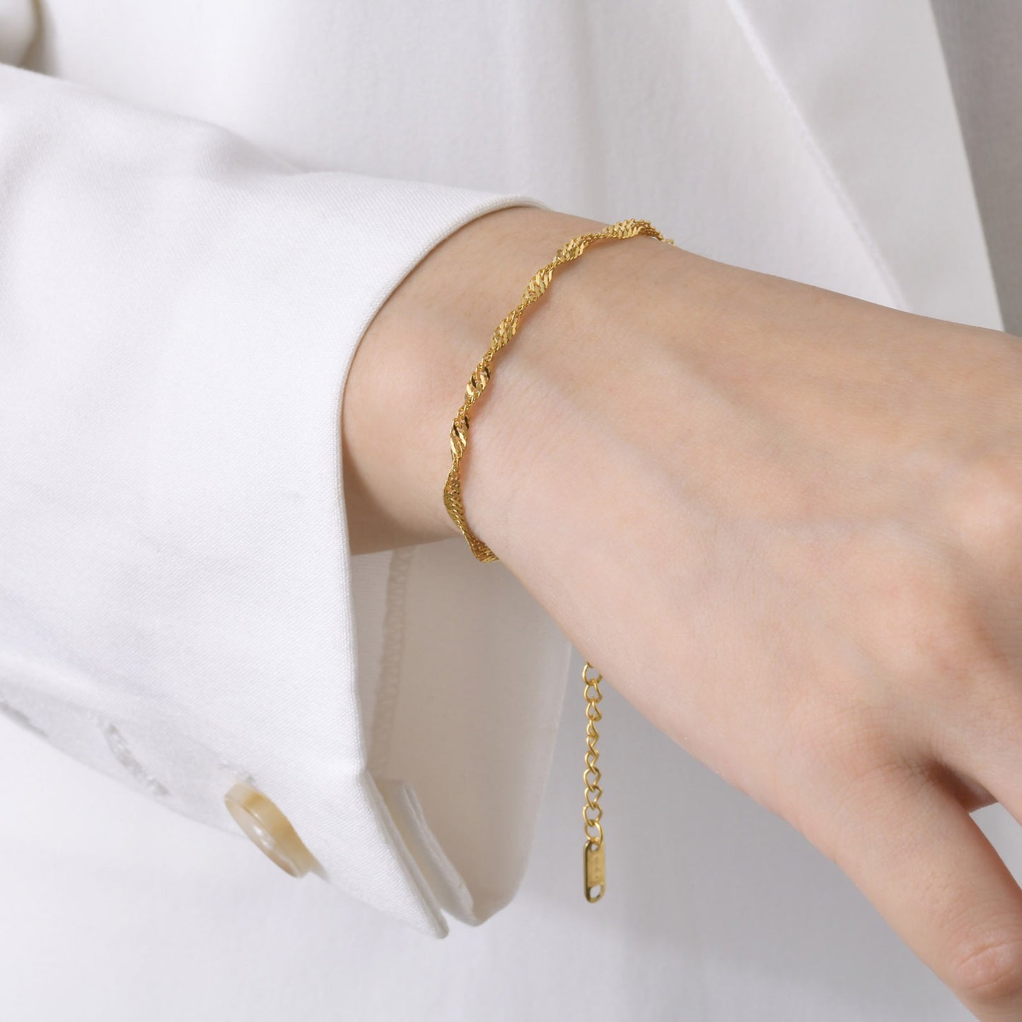 Bracciale e cavigliera in acciaio inossidabile con effetto onda d'acqua - Eleganza personalizzata per la grazia quotidiana BR-1315