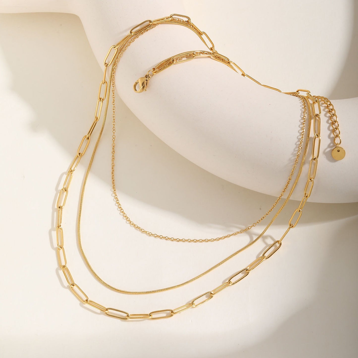Triple-Layered Stainless Steel Necklace with Flat Cross, Snake & Square Chains – Modern Minimalist Jewelry for Women NC-1353