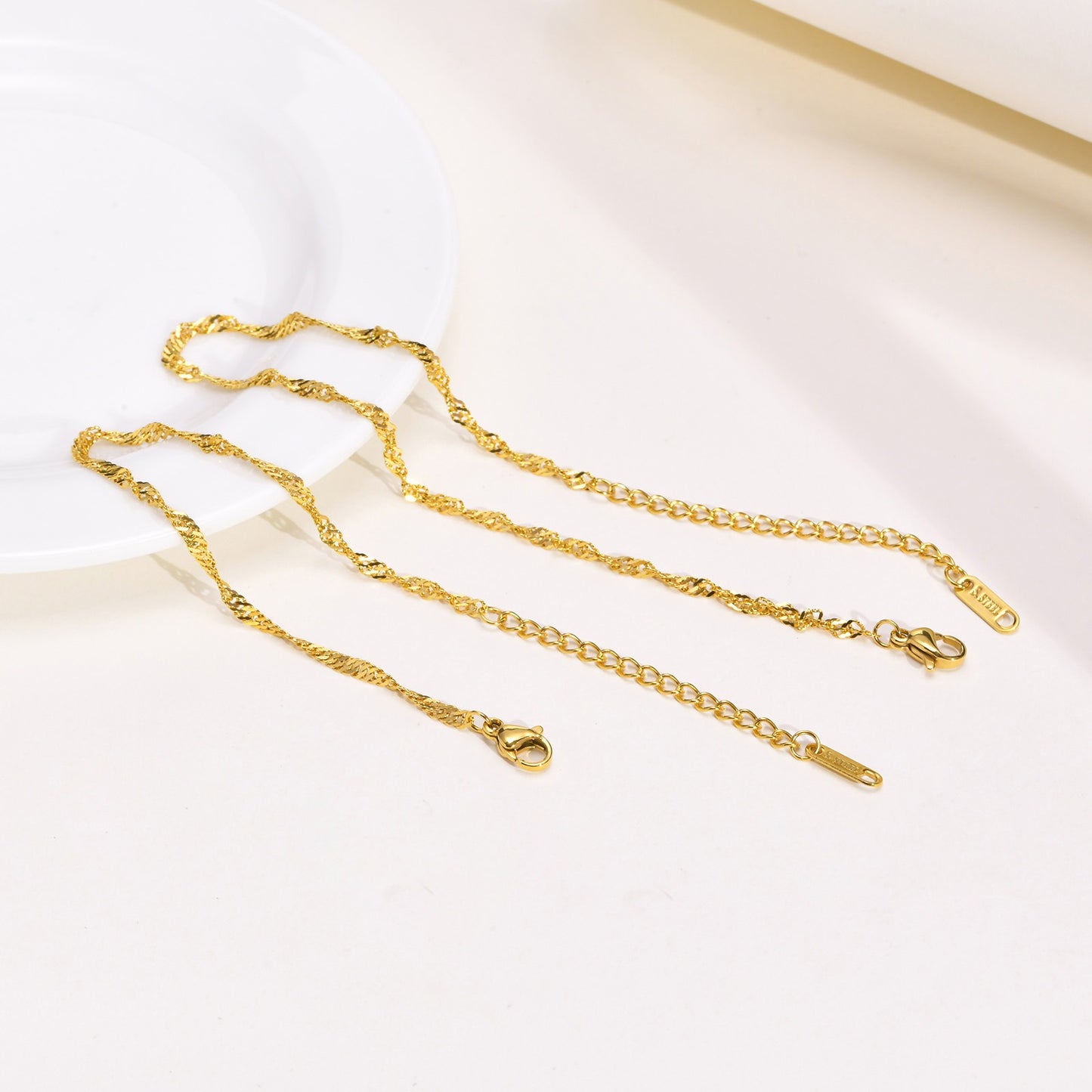 Bracciale e cavigliera in acciaio inossidabile con effetto onda d'acqua - Eleganza personalizzata per la grazia quotidiana BR-1315