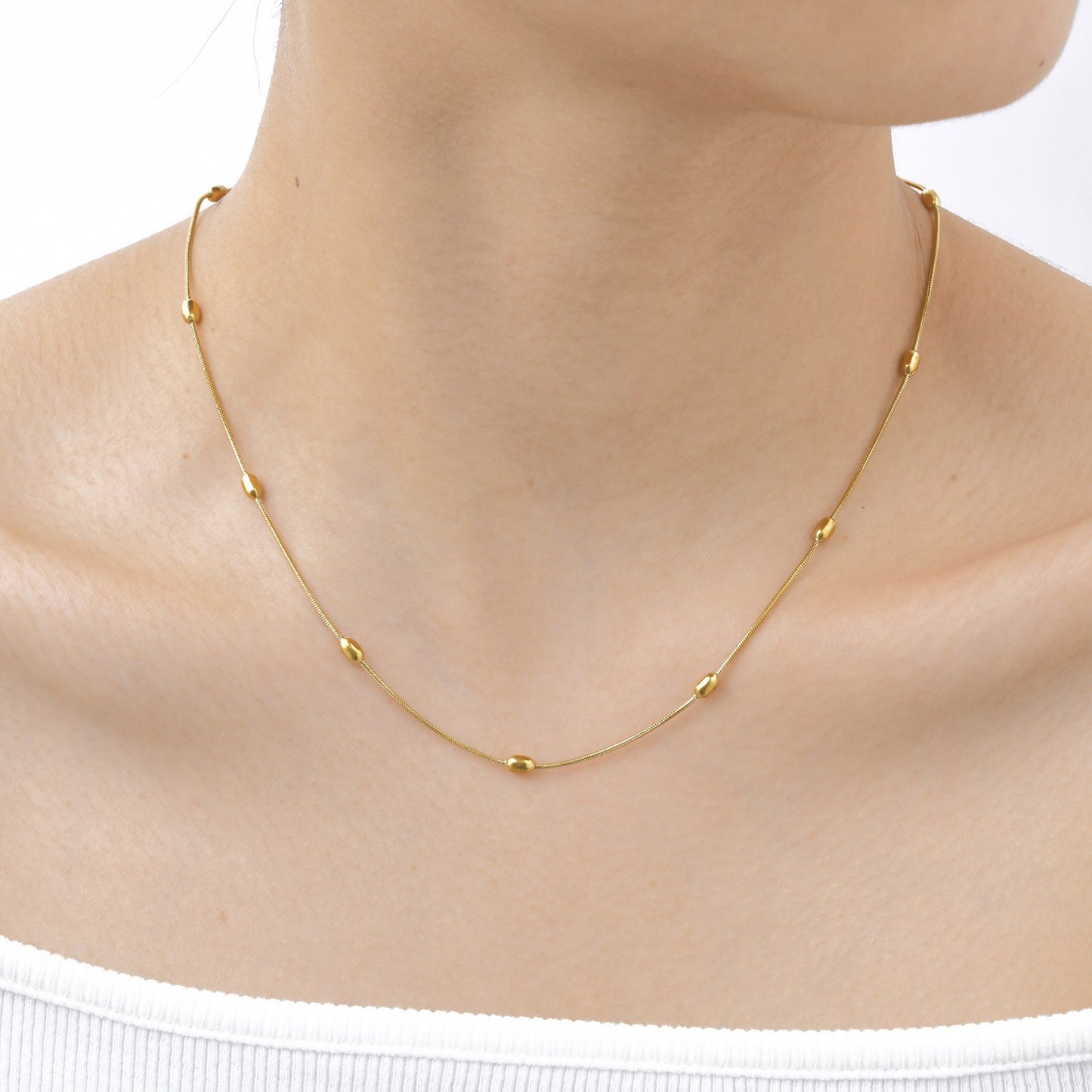 Collar de cadena de serpiente Kemstone de acero inoxidable dorado - Diseño delicado con cuentas para mujer, joya minimalista para el día a día NC-1639