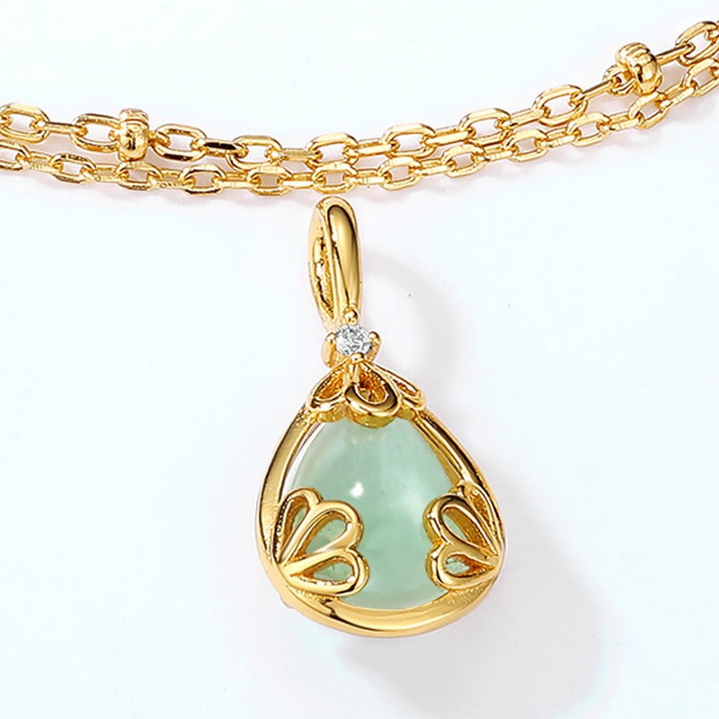Collar con colgante de aventurina en forma de lágrima y cristal blanco, diseño original artesanal de Kemstone - Diseño de corona en plata de ley S925