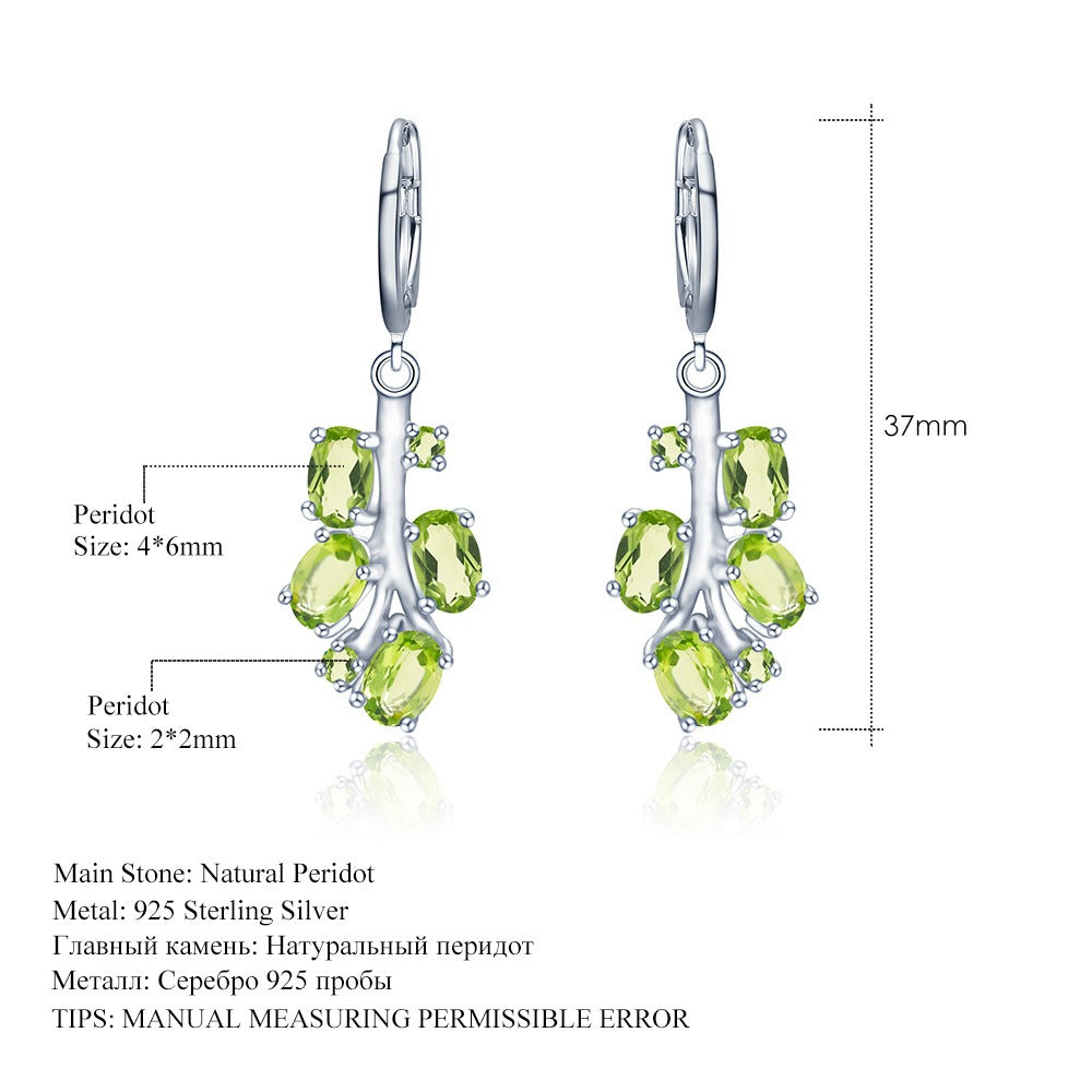 Pendientes de plata de ley con diseño original de Kemstone, hechos a mano, con topacio y peridoto naturales.