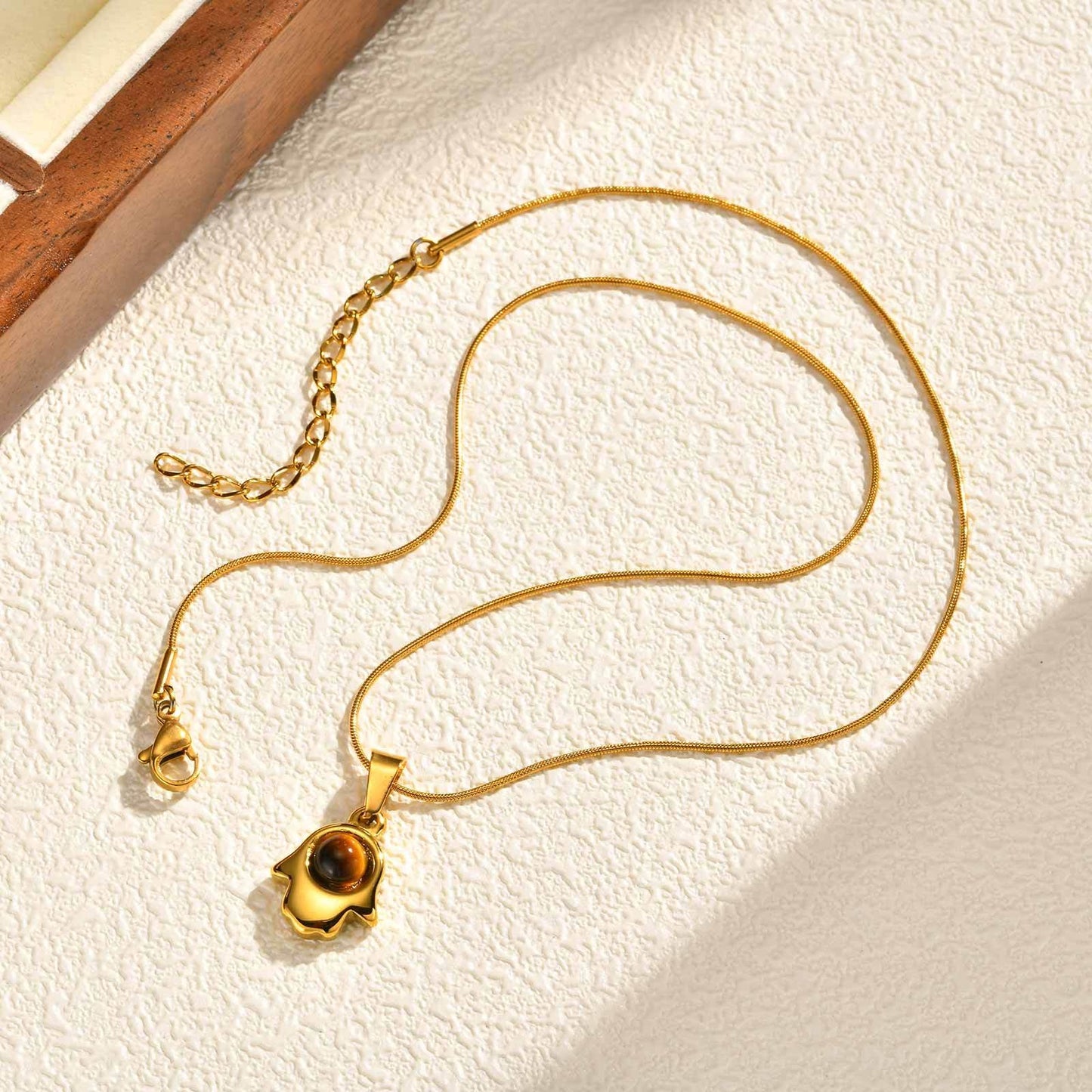 Kemstone Stainless Steel Hamsa Hand Tiger Eye Horn Pendant Necklace – Layered Design for Men & Women PN-2332