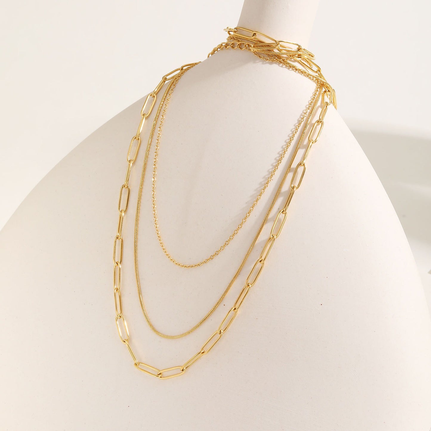 Triple-Layered Stainless Steel Necklace with Flat Cross, Snake & Square Chains – Modern Minimalist Jewelry for Women NC-1353