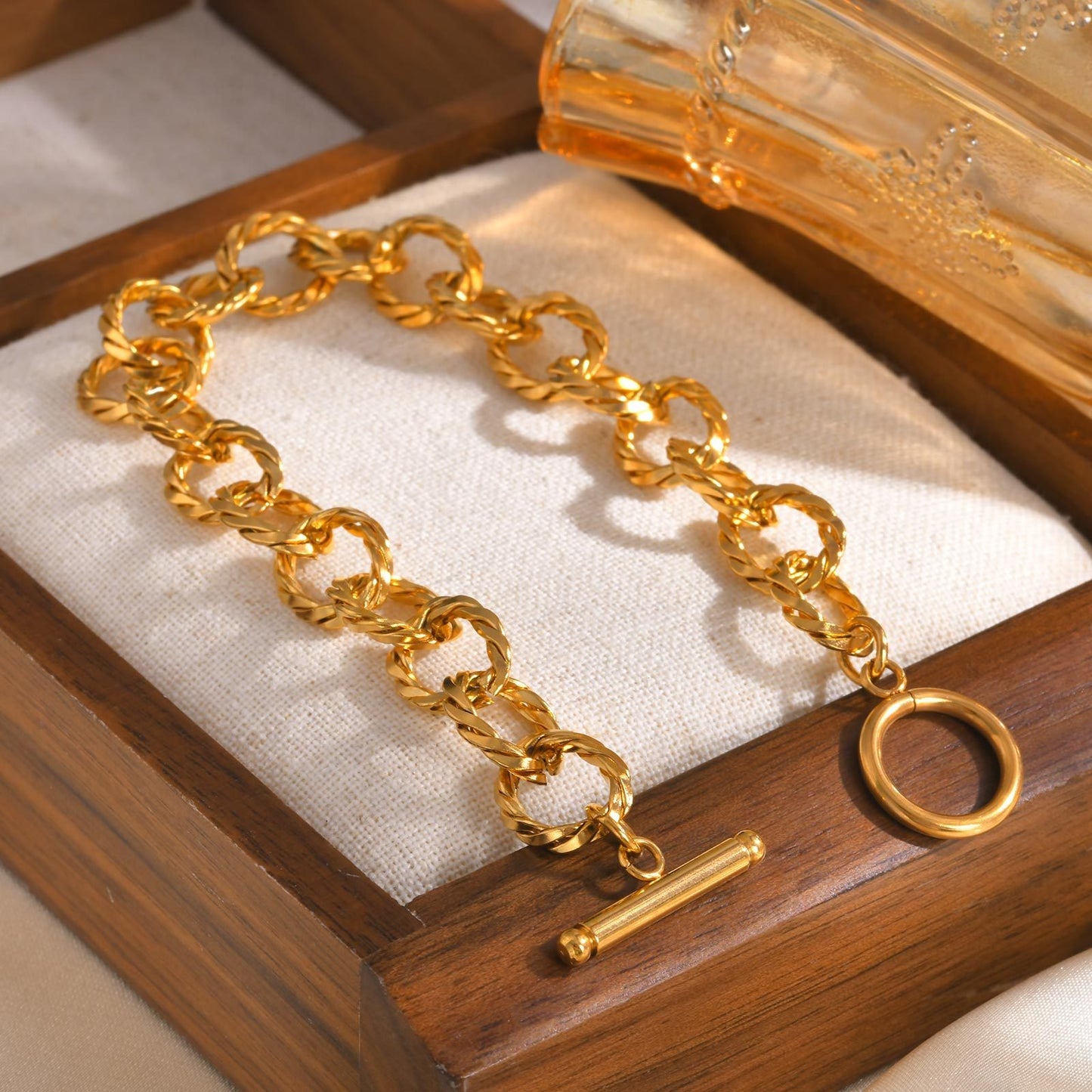 Bracciale Kemstone in acciaio inossidabile con corda intrecciata e chiusura OT - Gioiello con catena spessa color oro per donna BR-2201