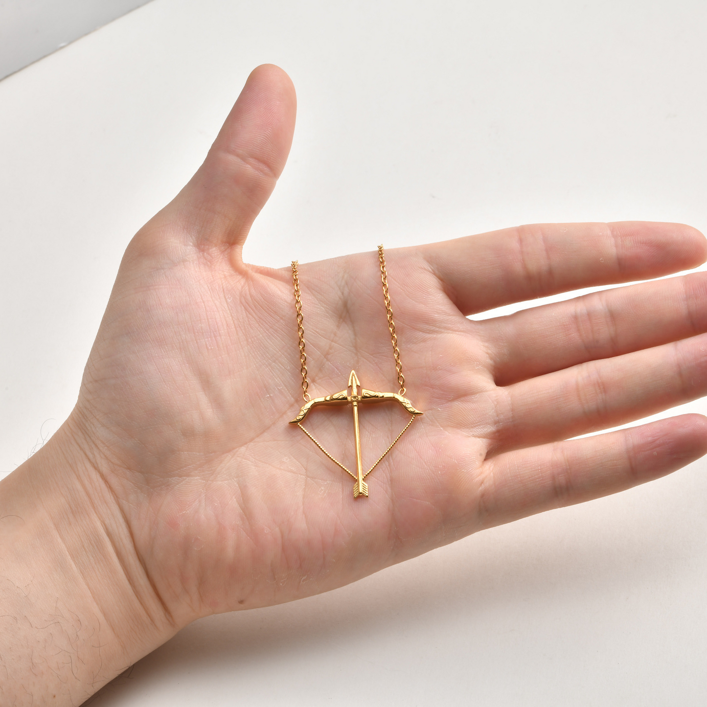 Kemstone Stainless Steel Bow Arrow Pendant Necklace for Men Gold Tone NC-2638G