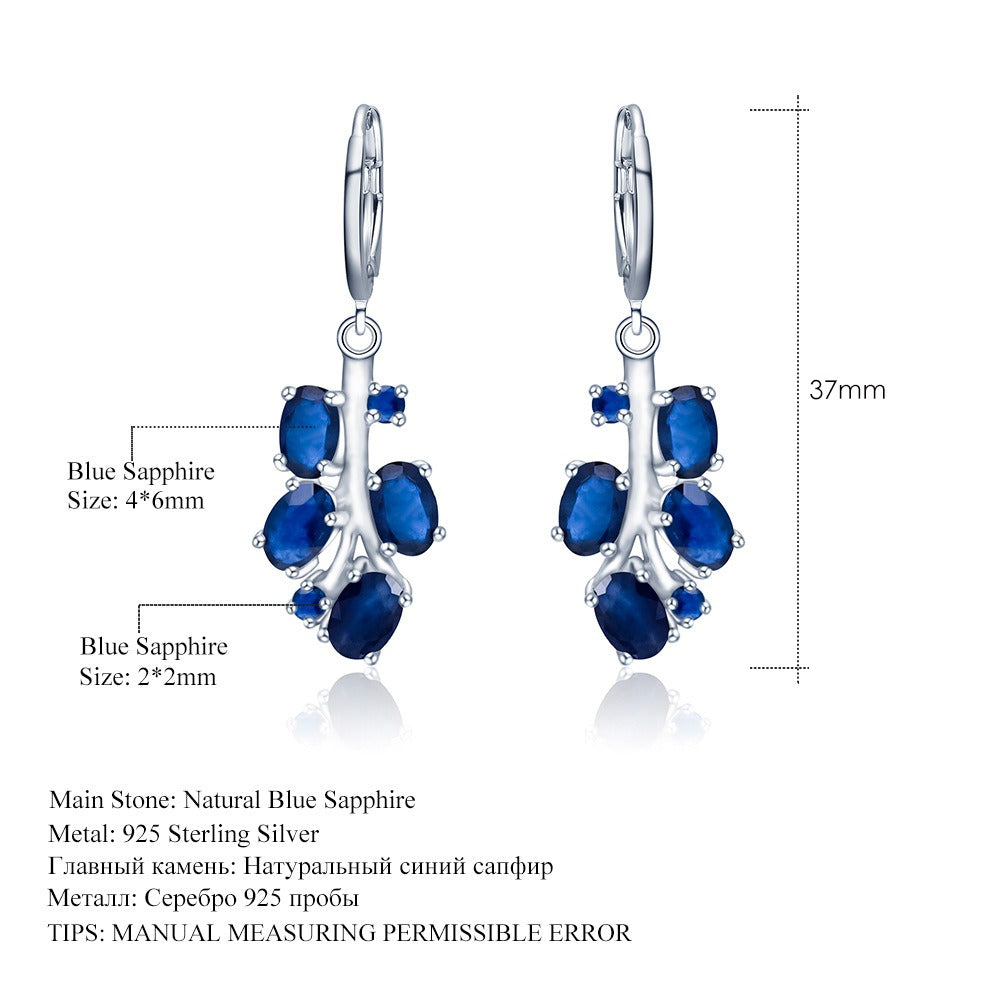 Pendientes de plata de ley con diseño original de Kemstone, hechos a mano, con topacio y peridoto naturales.