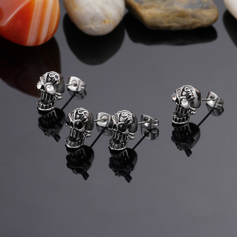Kemstone Titanium Steel Skull Stud Earrings with Cubic Zirconia Eyes for Men KE71194