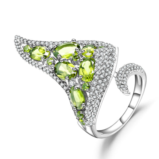 Anillo de diseño único y lujoso de peridoto verde en plata de ley 925, hecho a mano por Kemstone. Diseño original para mujer.