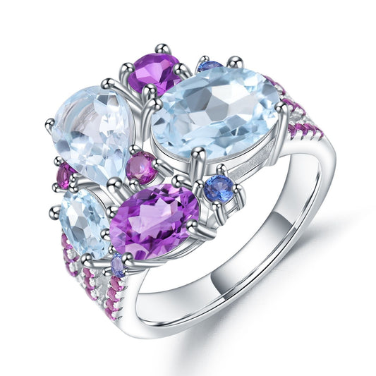 Anillo de cóctel de topacio azul cielo y amatista, diseño original artesanal de Kemstone, en plata de ley 925.