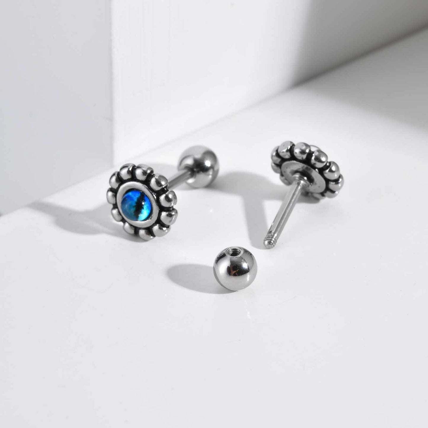 Kemstone Stainless Steel Symbolic Resin Demon's Eye Stud Earrings for Men – Silver ES-749