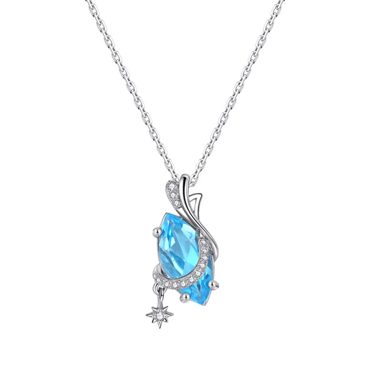 Collar de viaje estelar de diseño original hecho a mano por Kemstone: colgante de estrella de topacio azul suizo en plata de ley 925, un delicado regalo de inspiración cósmica.