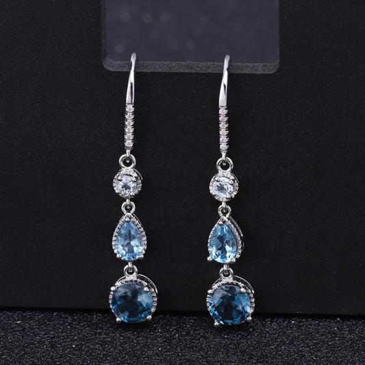 Pendientes colgantes de topacio azul natural, diseño original, hechos a mano por Kemstone en plata de ley S925 para mujer.